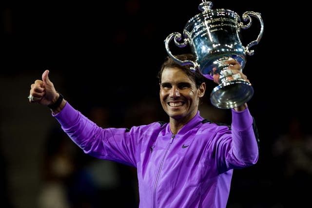 Rafael Nadal celebrates with the US Open men's singles trophy