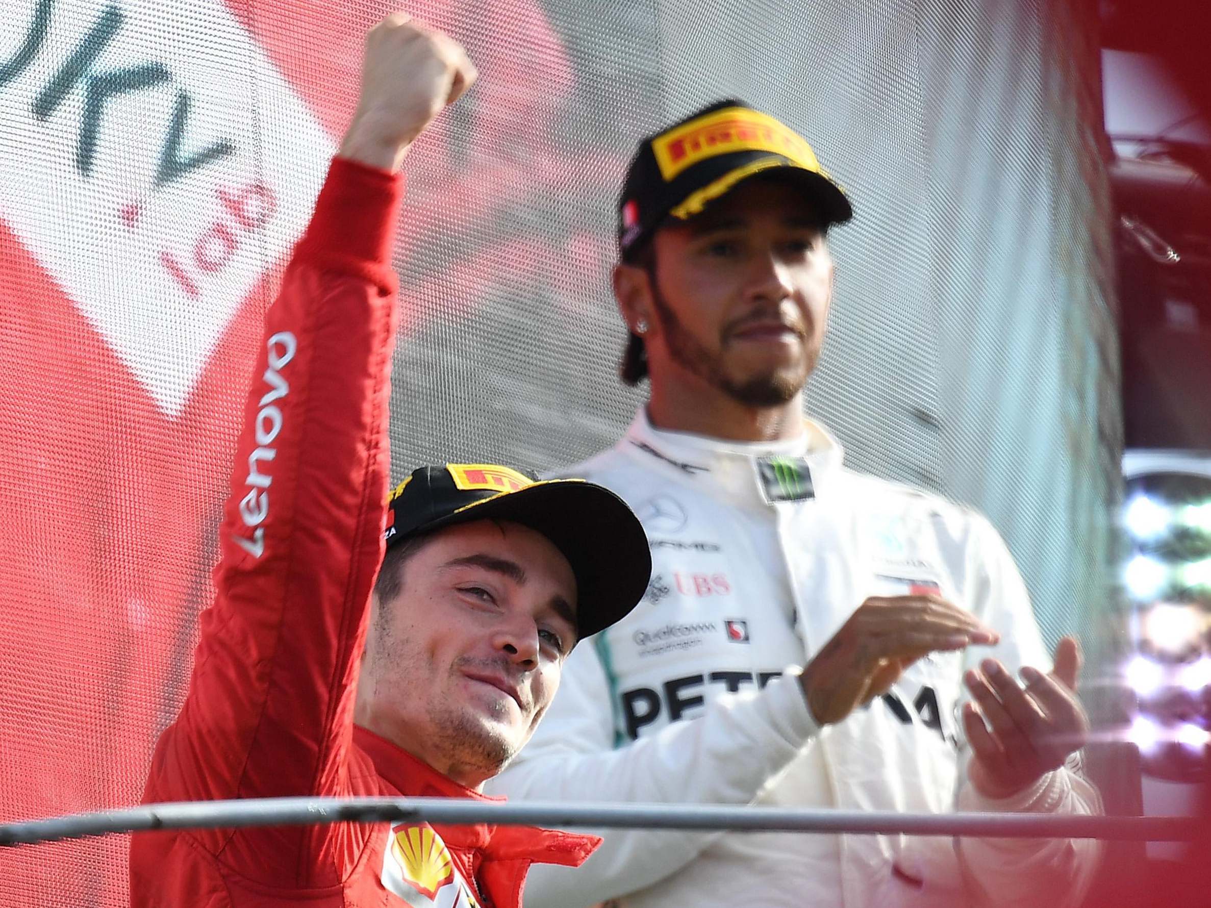 Charles Leclrec celebrates on the podium after winning the Italian Grand Prix