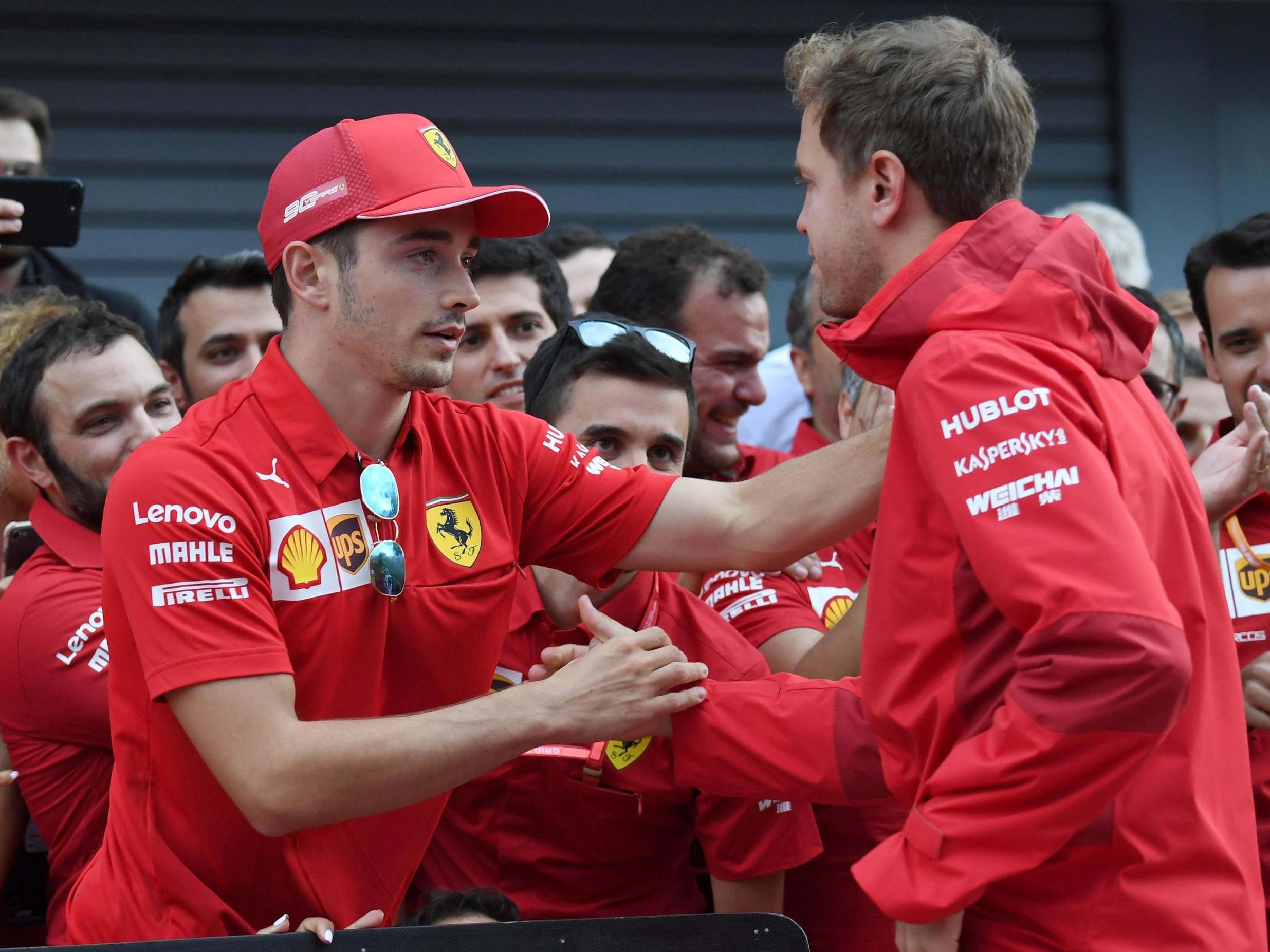 Charles Leclerc shakes hands with Sebastian Vettel after the Italian Grand Prix