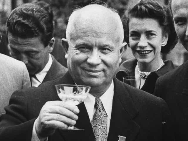 Khrushchev raises a glass to toast a chess game at the US Embassy in July 1955