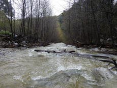 Family trapped atop waterfall send SOS message in plastic bottle and someone finds it