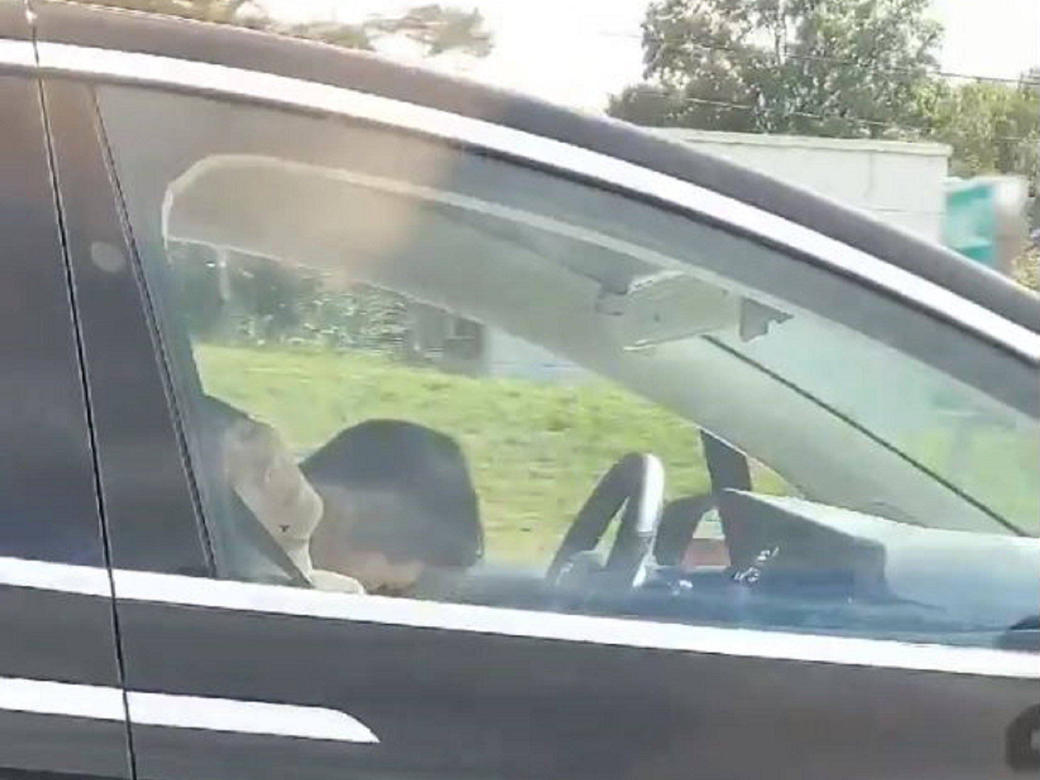 Still image taken from video appearing to show a driver asleep at the wheel of a Tesla car in Boston, Massachusetts, 8 September 2019.