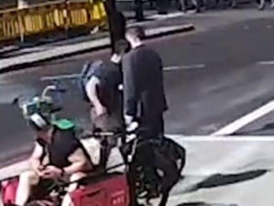 Cyclist headbutts pedestrian after near collision because he ran red light