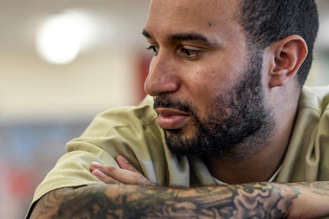 Jorge Henriquez, 32, who is scheduled for parole in February, cut more than a year off his five-year sentence for dealing cocaine by taking classes and working in the prison car body shop