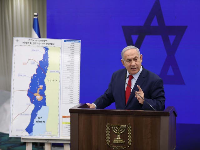 Israeli prime minister Benjamin Netanyahu shows a map of the Jordan Valley as he delivers a statement on Tuesday