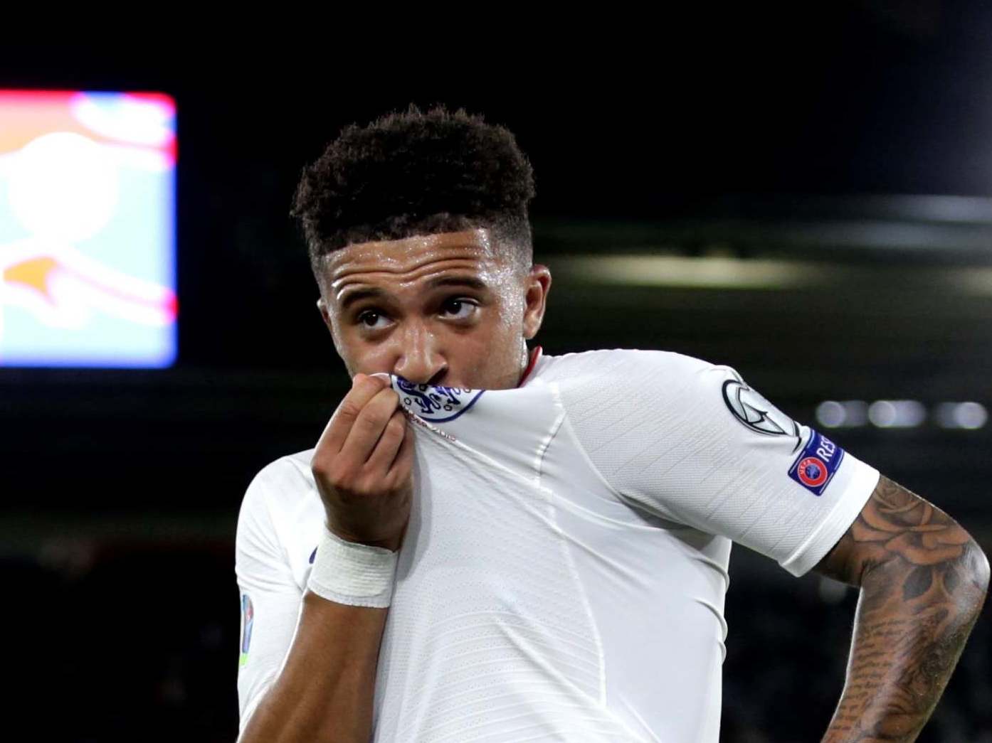 Jadon Sancho celebrates scoring his first England goal