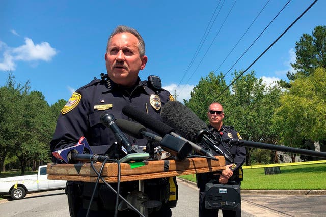 Steven Outlaw, acting police chief in Tallahassee, Florida, briefs reporters over the stabbing of five people at a building supply company