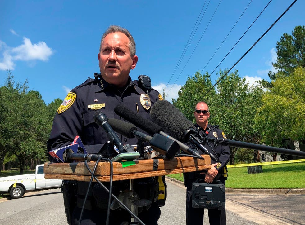Steven Outlaw, acting police chief in Tallahassee, Florida, briefs reporters over the stabbing of five people at a building supply company