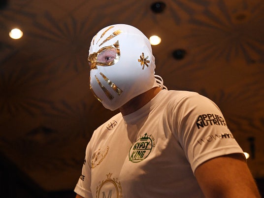 Tyson Fury sports a lucha libre mask during his open workout