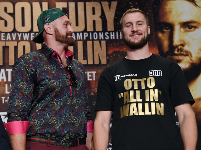 Boxers Tyson Fury (L) and Otto Wallin pose