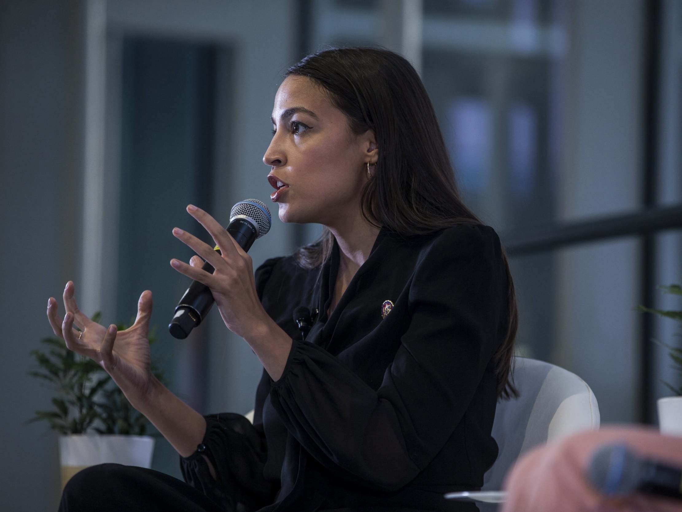 AOC calls out Republican for running TV ad with skulls and pictures of her on fire 'to convince people they aren't racist'