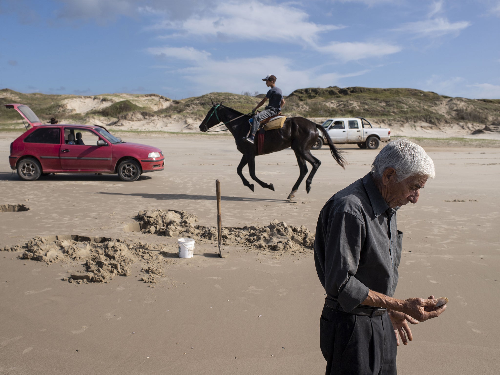 Jose Rocha has been gathering yellow clams in Barra del Chuy for most of his life