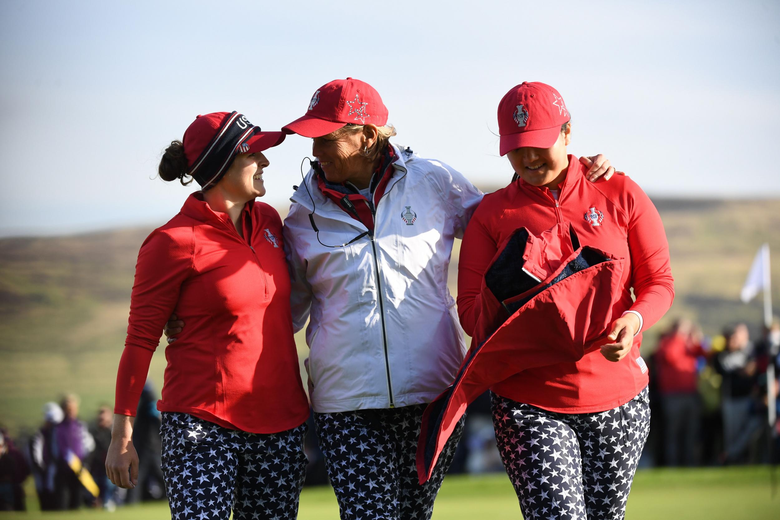 America's Angel Yin and Ally McDonald leave the 13th after winning the match on the first day (AFP/Getty Images)