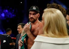 Fury beats Wallin after suffering two cuts to his eye early on