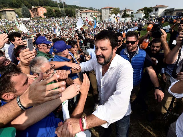 League party leader Matteo Salvini greets supporters during a packed rally in Pontida, Italy on 15 September