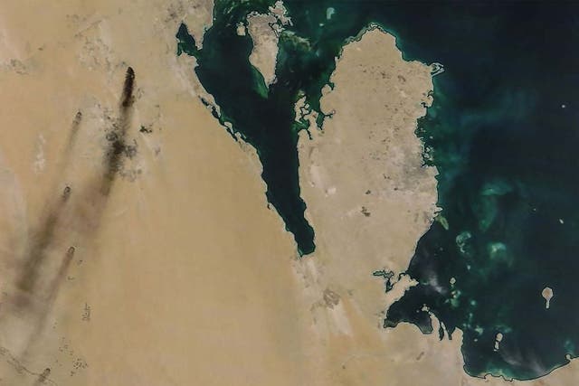A satellite image provided by NASA Worldview shows fires following drone strikes on two major oil installations owned by the state giant Aramco, in eastern Saudi Arabia
