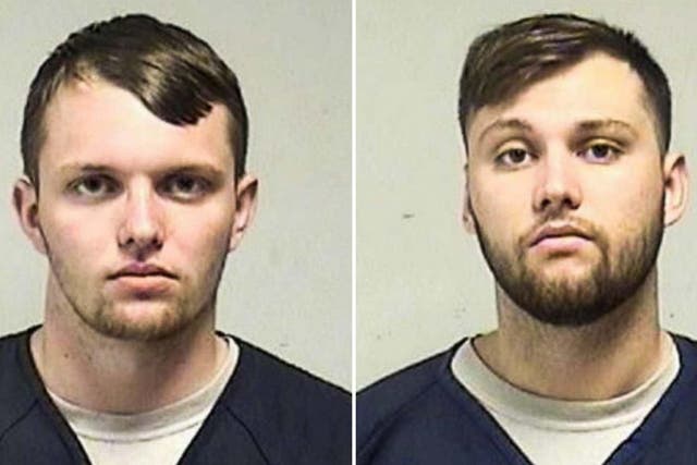 Tyler Huffhines and brother Jacob Huffhines were arrested after a raid on their family home in Wisconsin