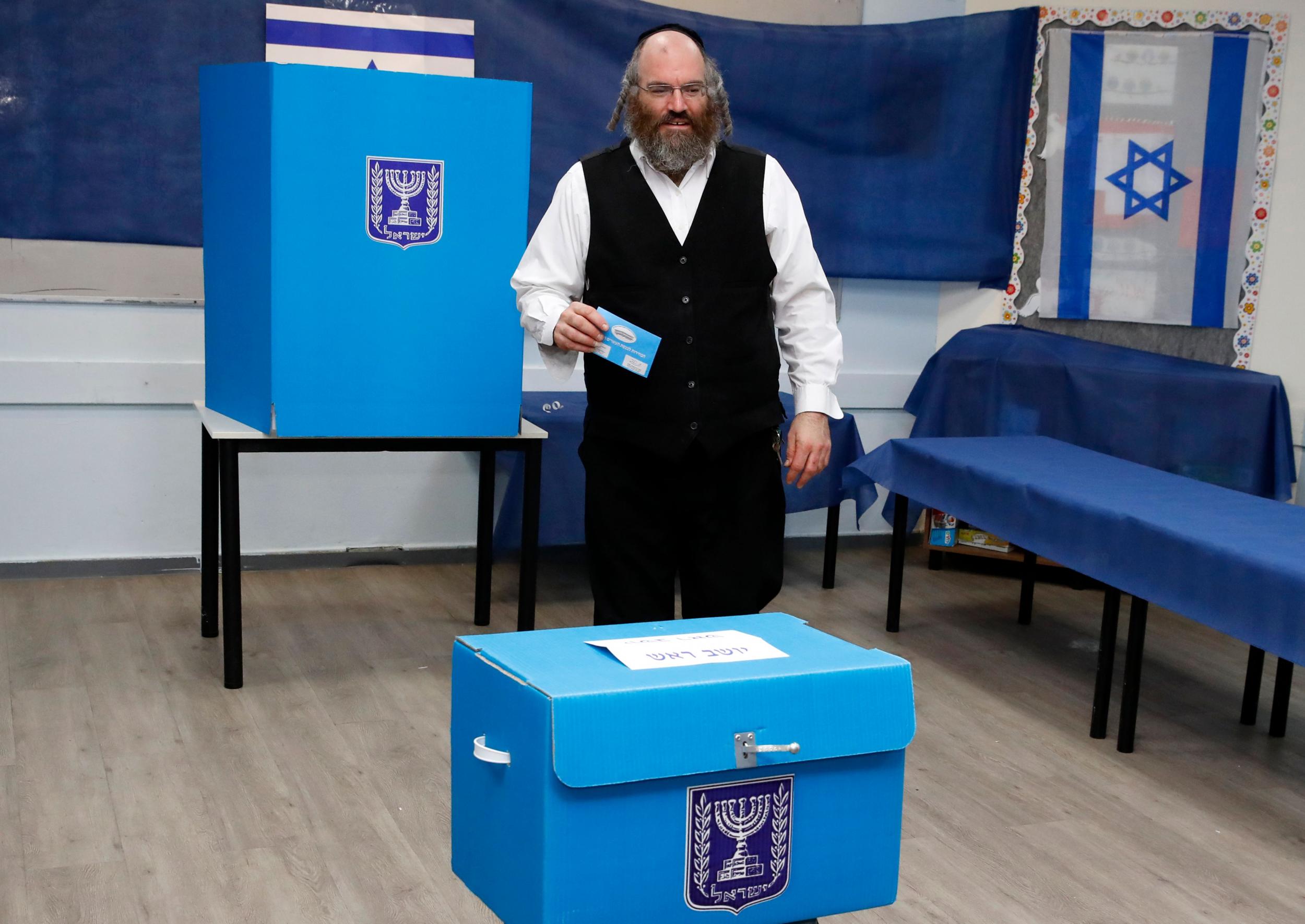 Israel election: Netanyahu sounds alarm over &apos;high Arab turnout&apos; as he battles to cling on to power