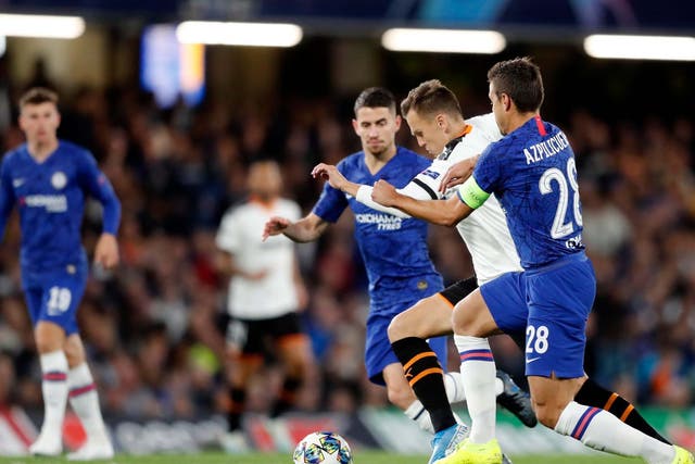Valencia's Denis Cheryshev duels for the ball with Chelsea's Cesar Azpilicueta