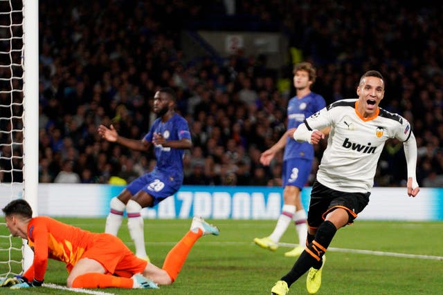 Rodrigo scores Valencia's winning goal at Stamford Bridge