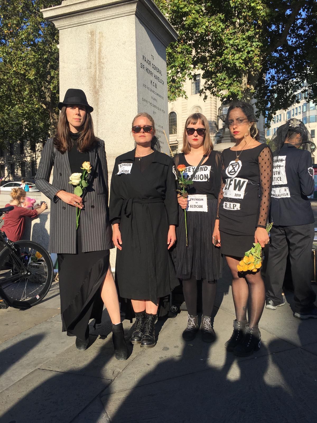 Some protesters wore all-black funeral outfits for the event