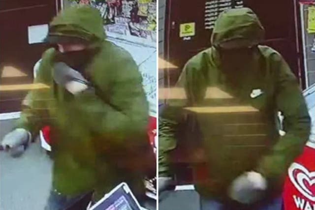 An armed robber was scared off by a little girl and her father throwing a loaf of bread at him at a shop in Worthing, West Sussex, 16 September 2019.