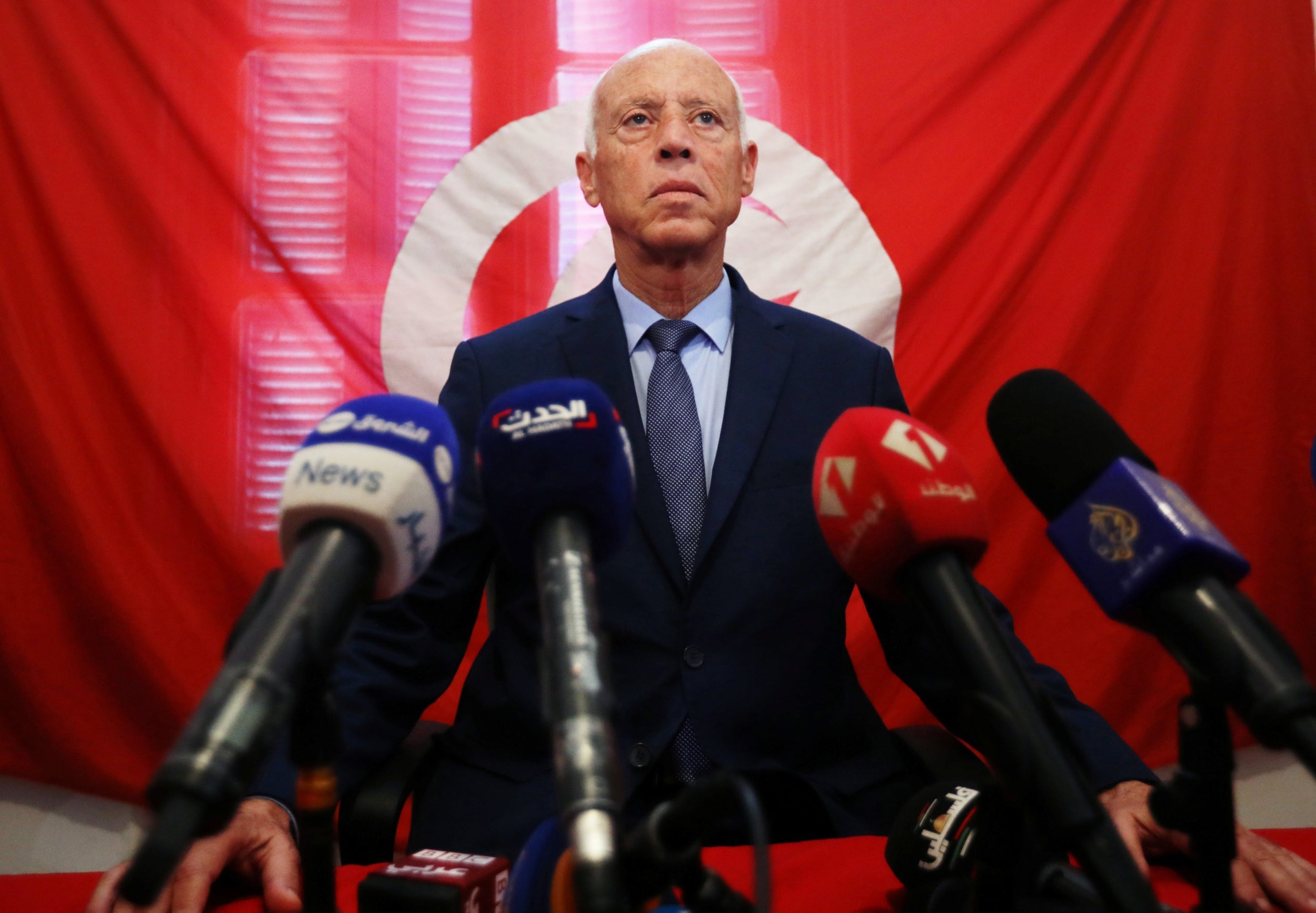 Presidential candidate Kais Saied speaks as he attends a news conference after the announcement of the results in the first round of Tunisia's presidential election in Tunis, Tunisia September 17, 2019.