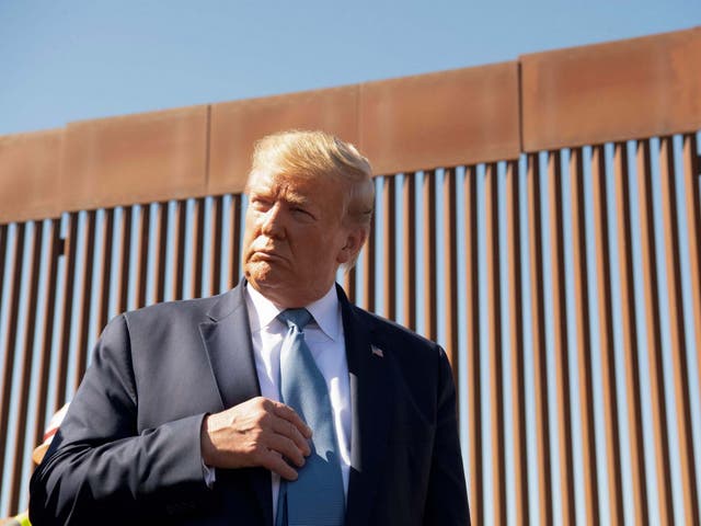 US president Donald Trump visits the US-Mexico border wall in Otay Mesa, California