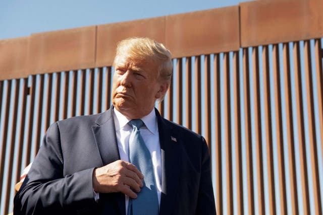 US president Donald Trump visits the US-Mexico border wall in Otay Mesa, California