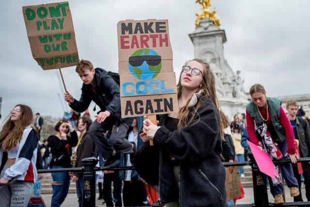 Young demonstrators take part in 'Global Strike 4 Climate' protest march in London on 15 March 2019