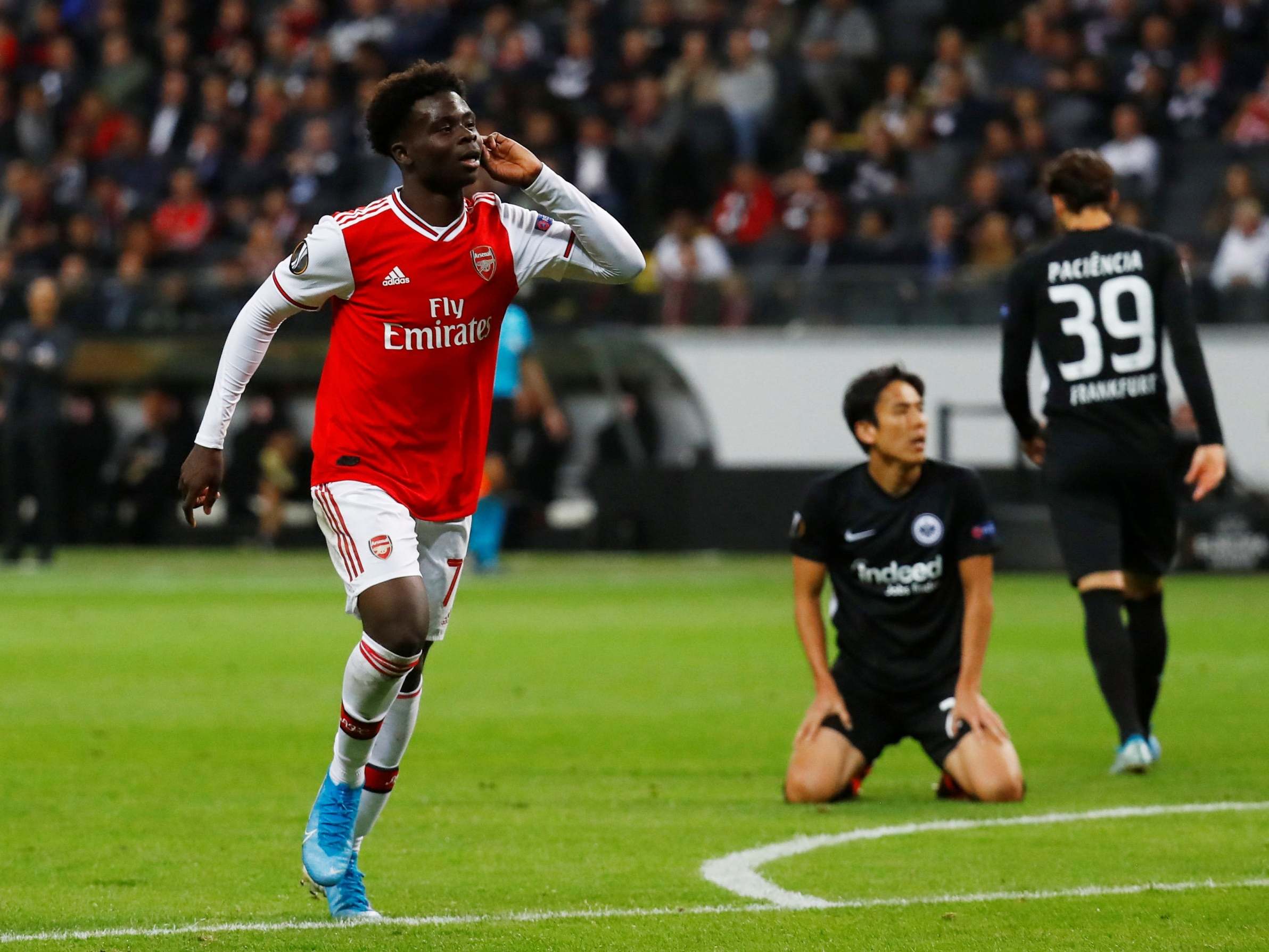 Bukayo Saka celebrates scoring Arsenal's second of the night