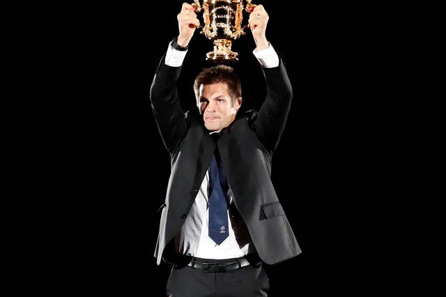 Richie McCaw presents the Webb Ellis Cup at the opening ceremony