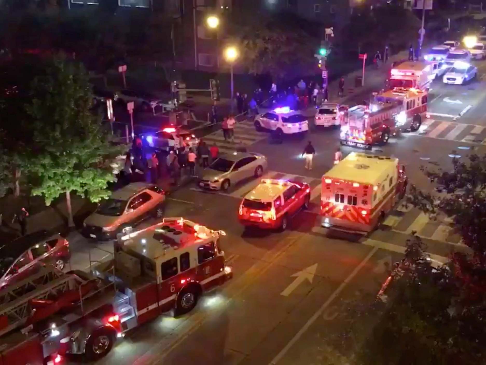 Rescue vehicles are seen following a shooting in Washington DC on 19 September