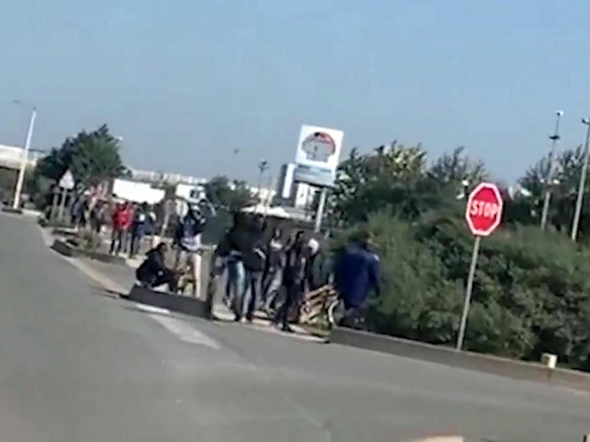 Far-right Britain First vigilantes pelted with rocks before mounting patrols on cliffs of Dover