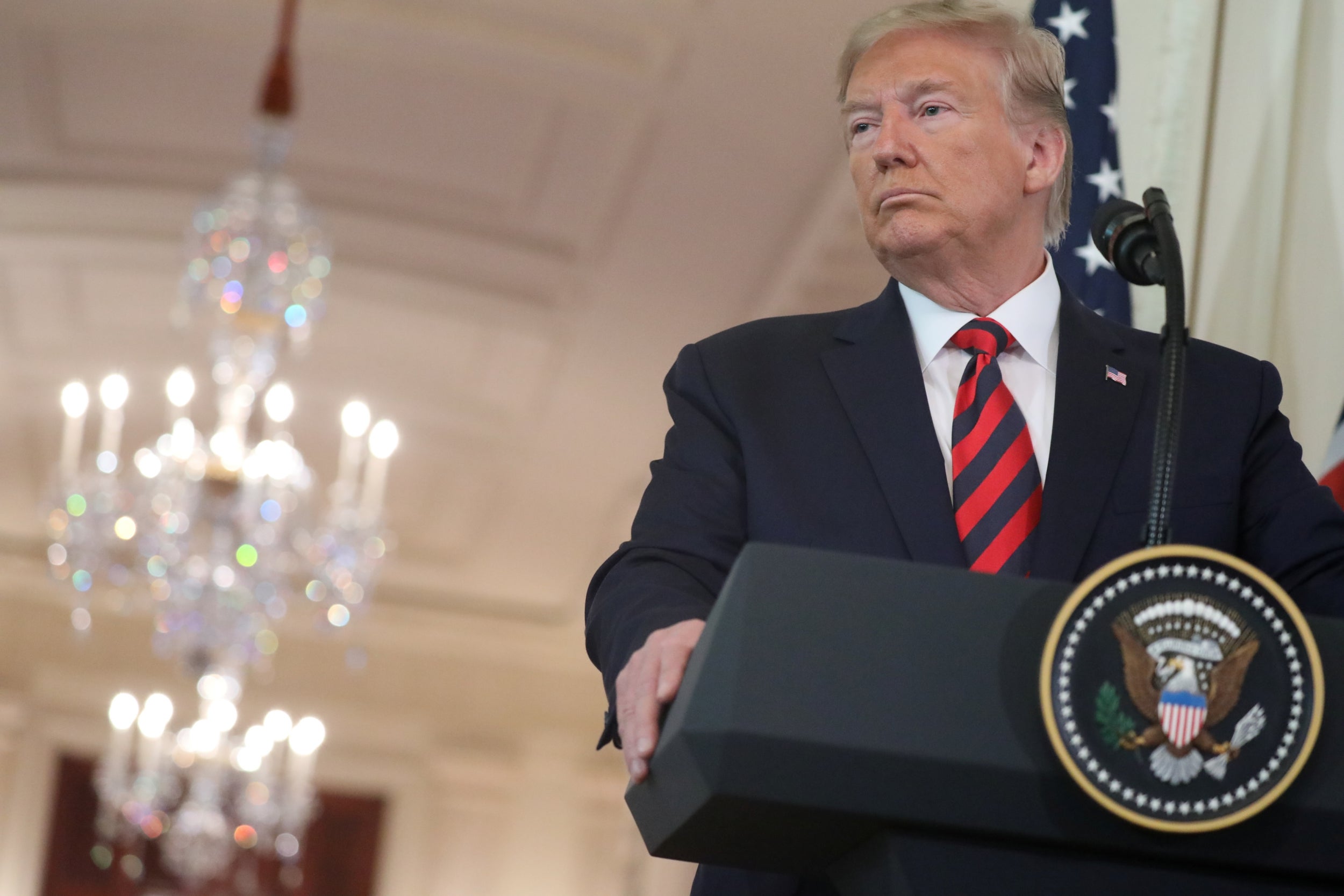 Trump said the whistleblower was 'partisan' before adding, bizarrely, that he 'doesn't know the identity' of the person