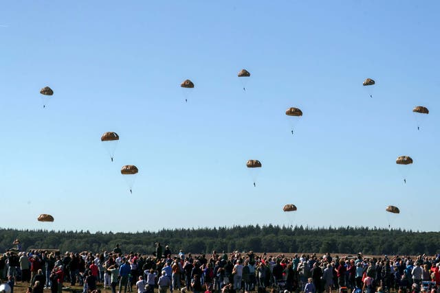 Blue skies and a large crowd at Ginkel Heath near Ede greet 1,500 paratroopers from Britain, the USA, the Netherlands and Poland