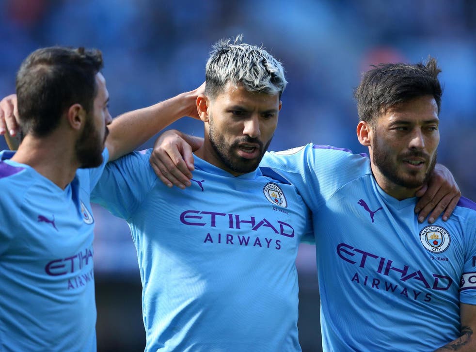 Bernardo Silva, Sergio Aguero and David Silva celebrate Manchester City's second goal