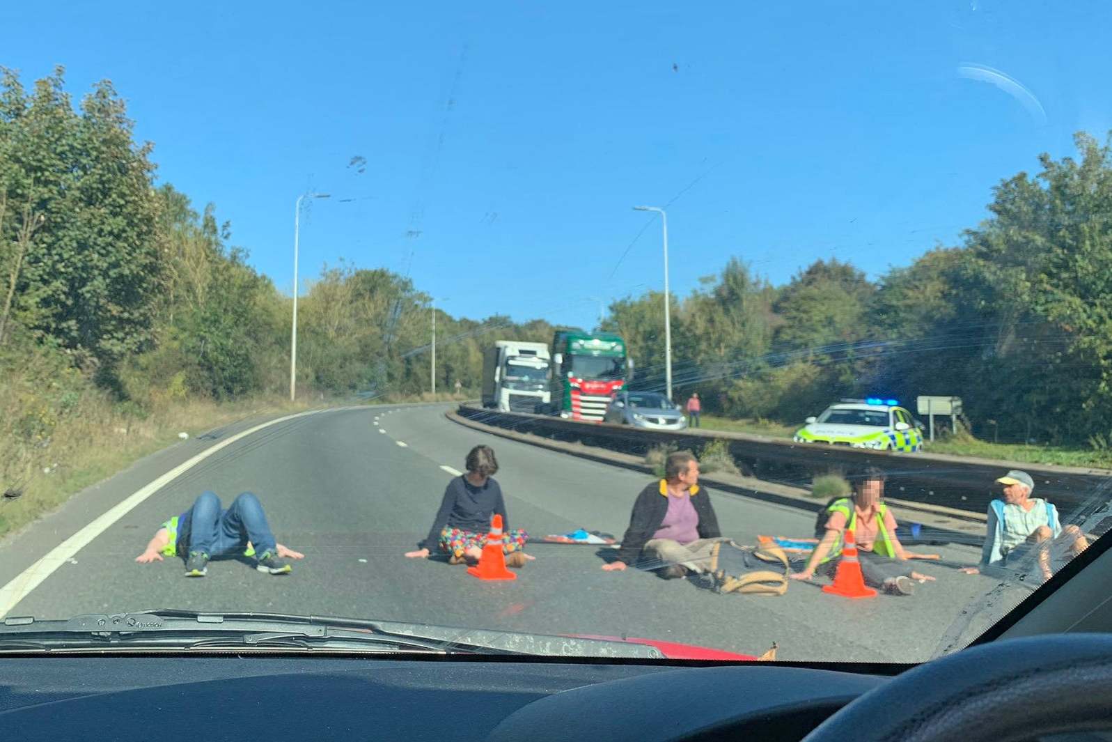 Extinction Rebellion: 91-year-old among activists arrested after elderly protesters &apos;glue&apos; themselves to Dover roads