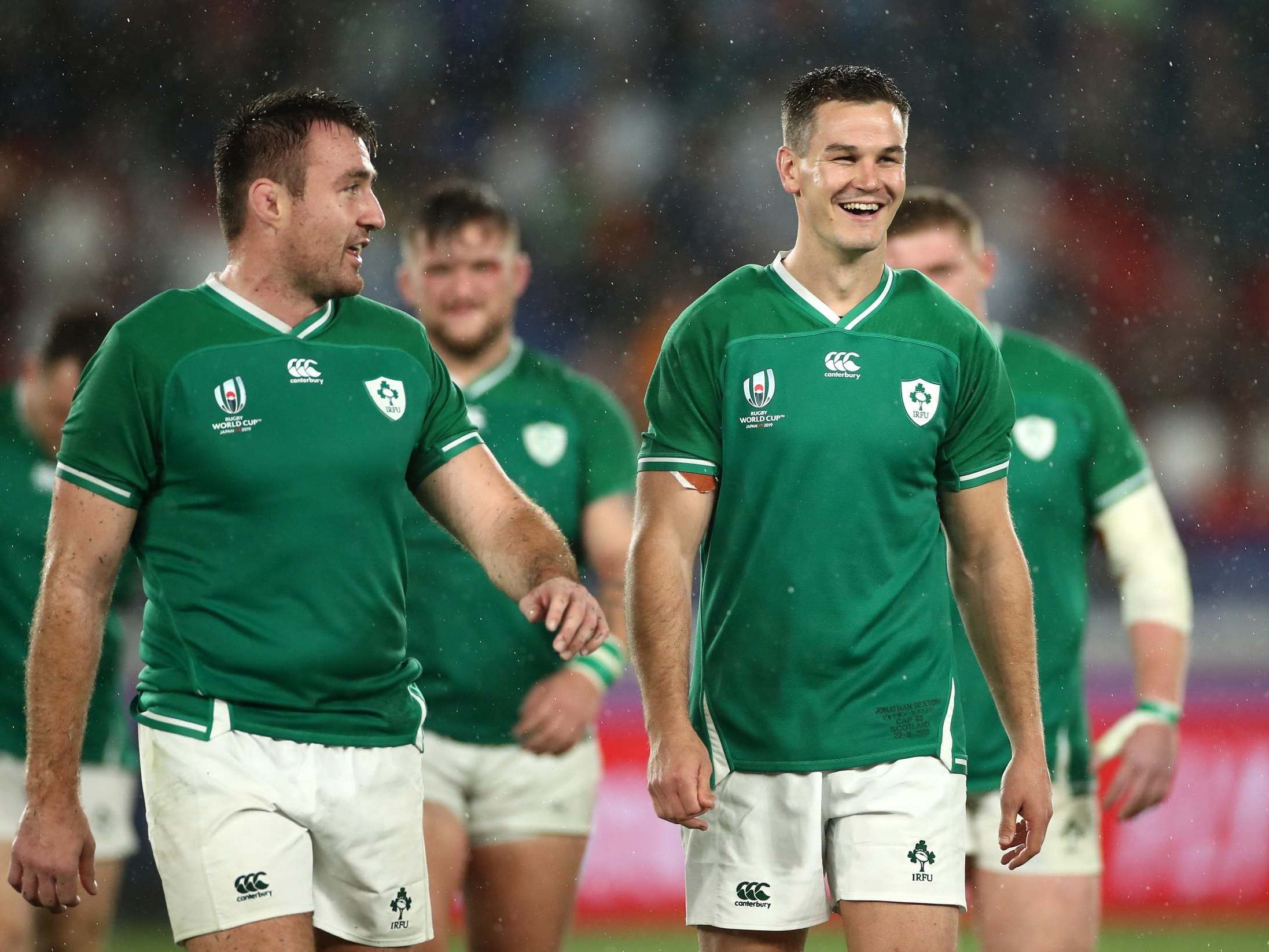 Ireland players leave the pitch all smiles after opening their World Cup with a win