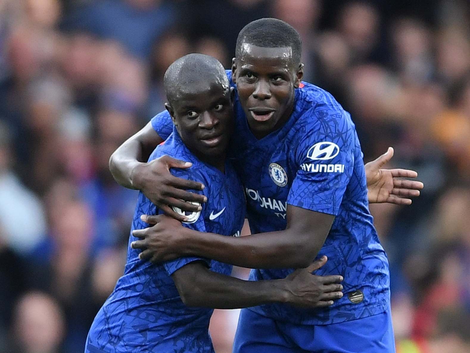 N’Golo Kante of Chelsea celebrates with Kurt Zouma