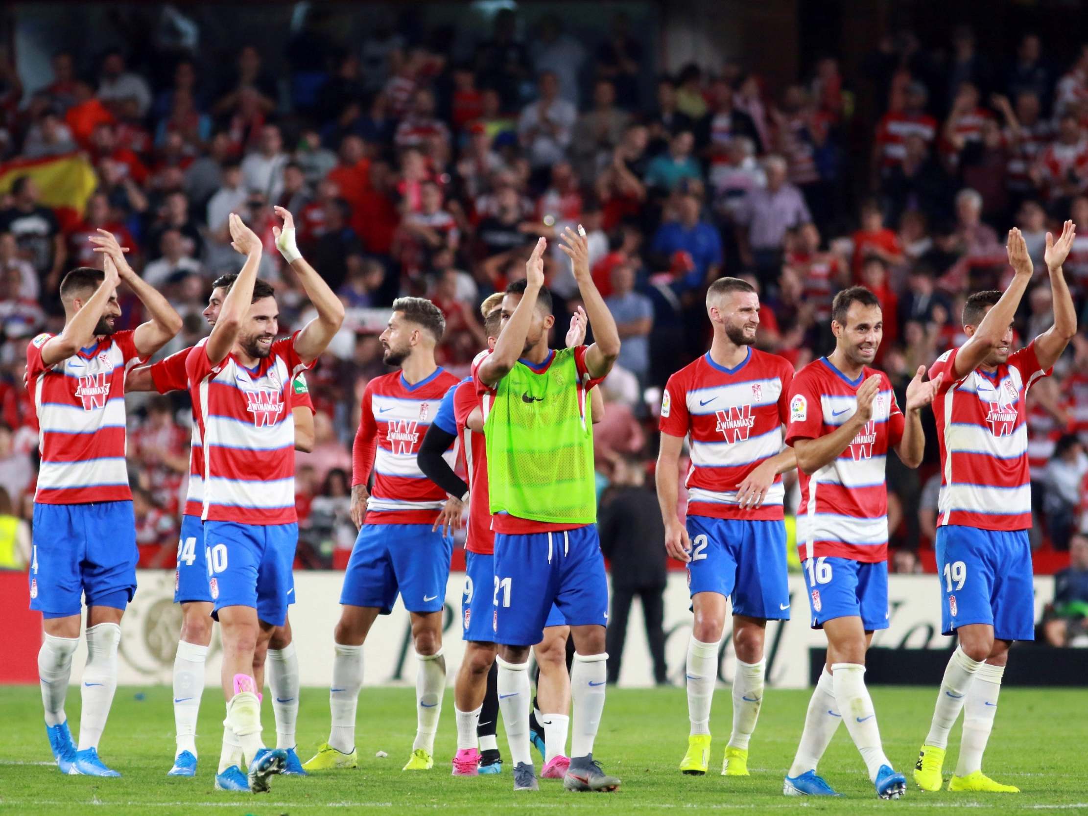 Granada applaud their fans after downing Barcelona