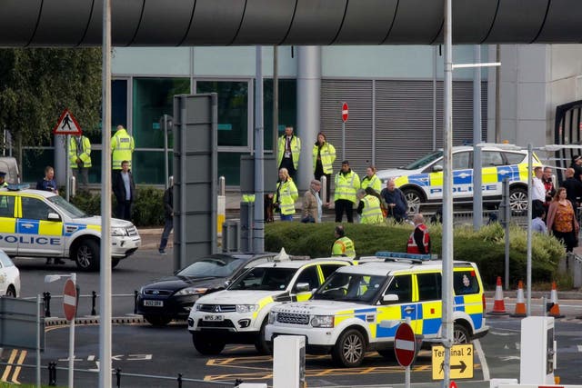 Bomb squads were called to deal with a suspect package and police evacuated the airport's train station