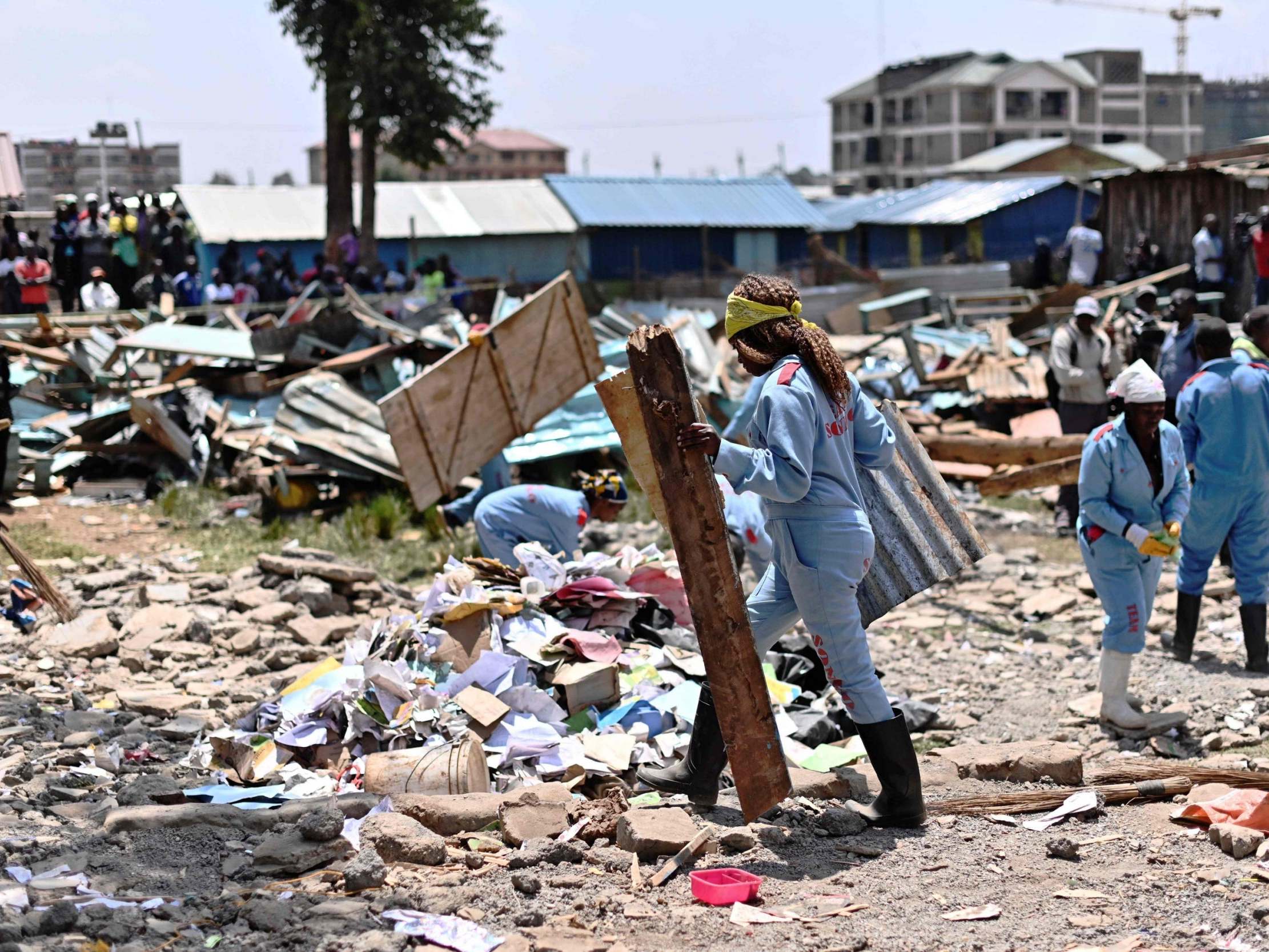 Rescuers tackle the devastation around a collapsed school building in Nairobi, where seven have died and dozens been left with injuries