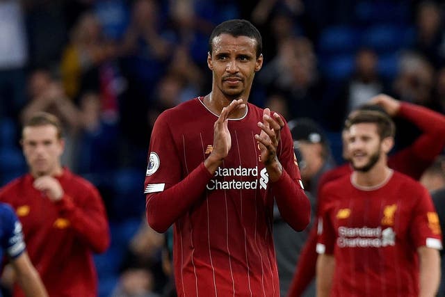 Joel Matip of Liverpool showing his appreciation to the fans