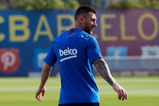Leo Messi attends a training session