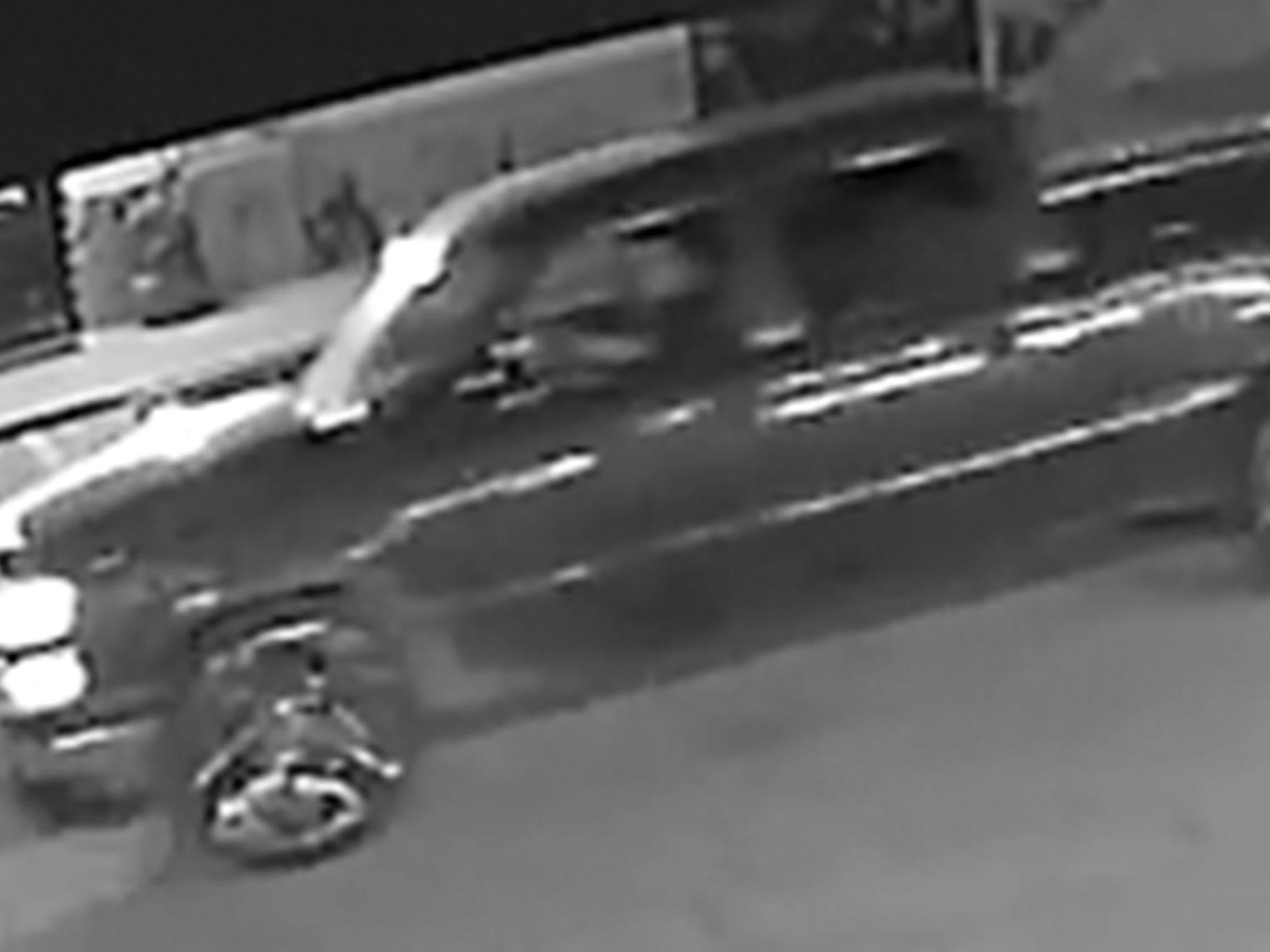 The suspect, a Latin male, was caught on CCTV driving a red Chevrolet truck