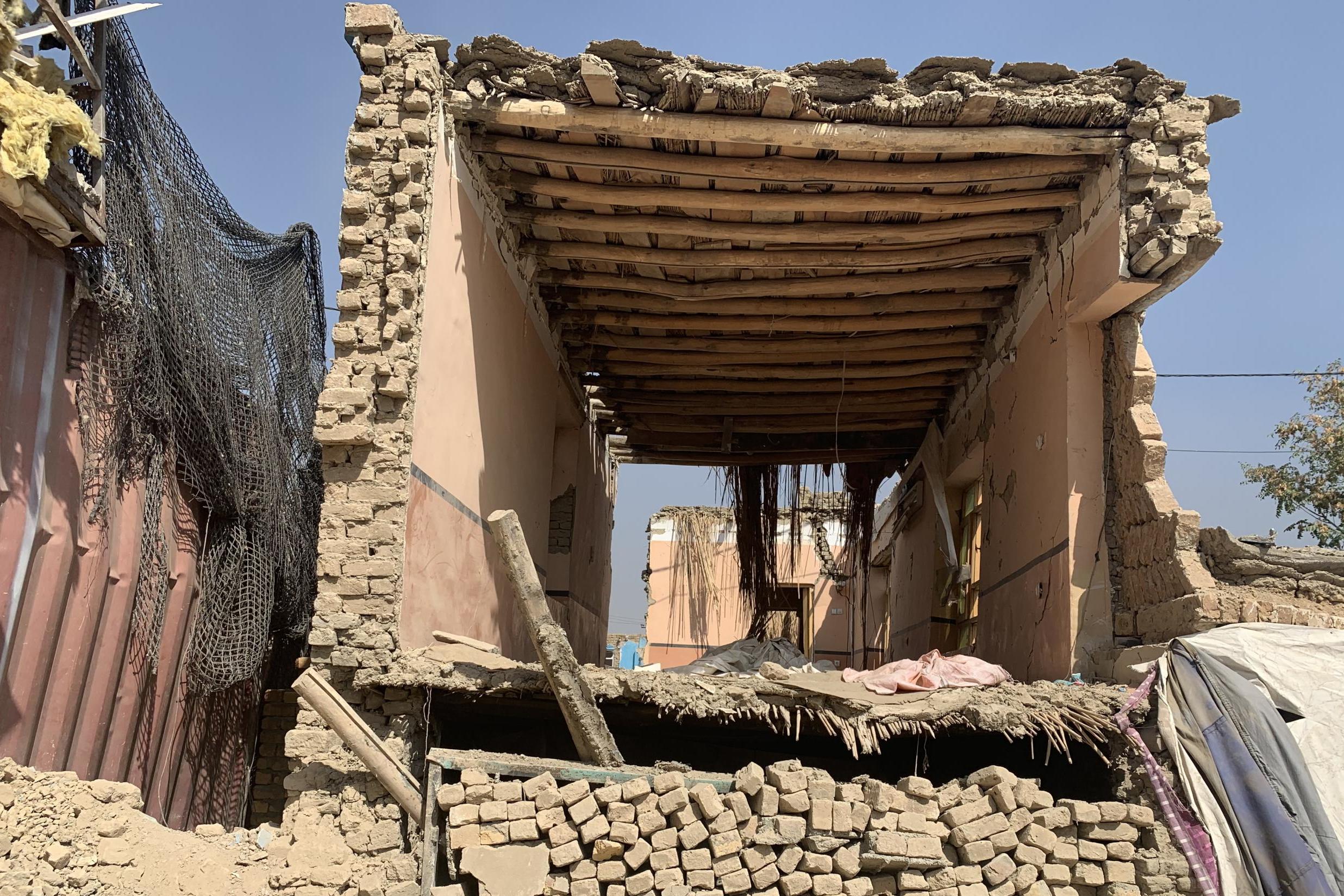 Houses in ruins after the Green Village truck bomb explosion