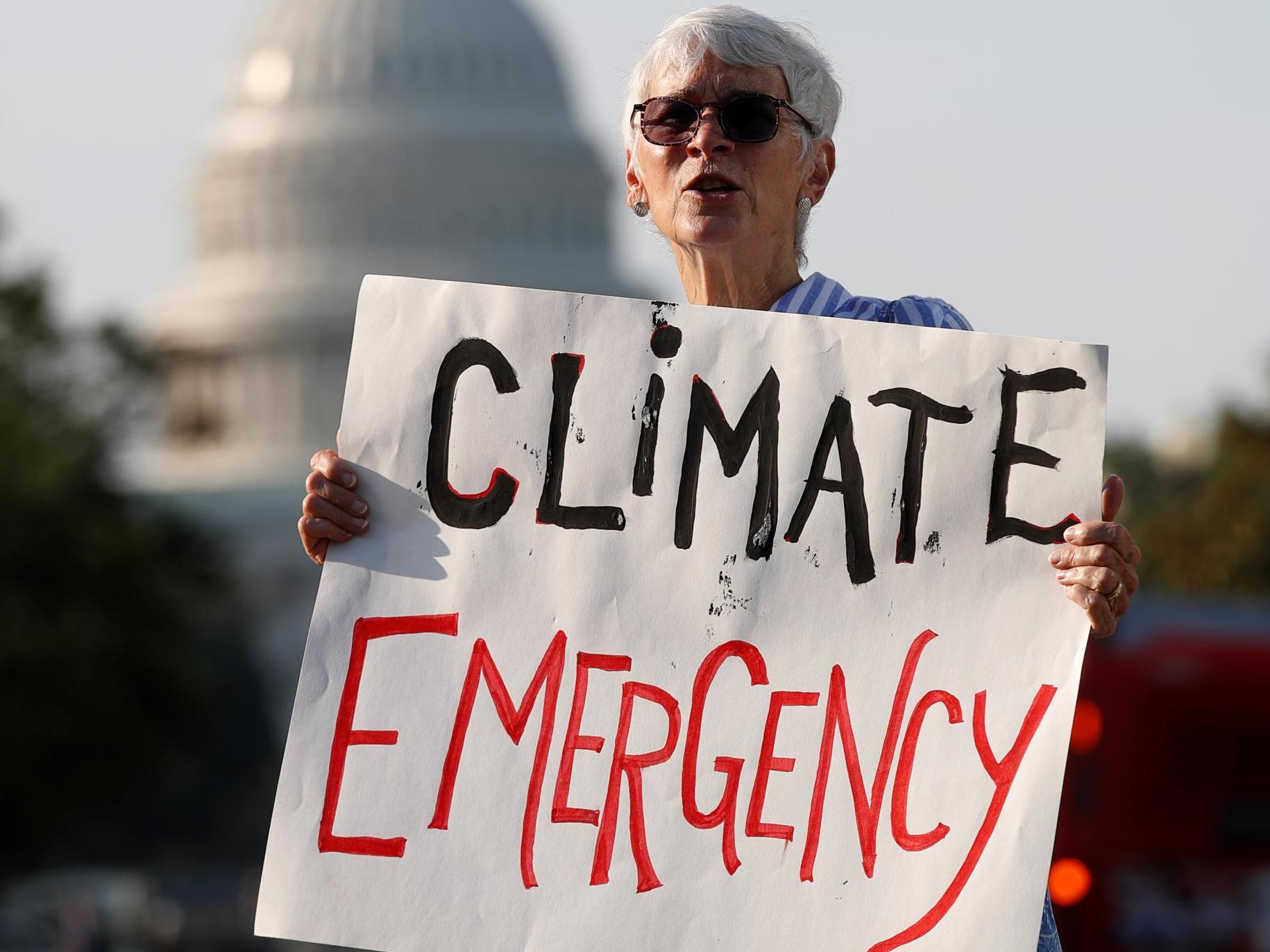 Police chainsaw climate activists from sail boat near White House as protesters shut down DC streets