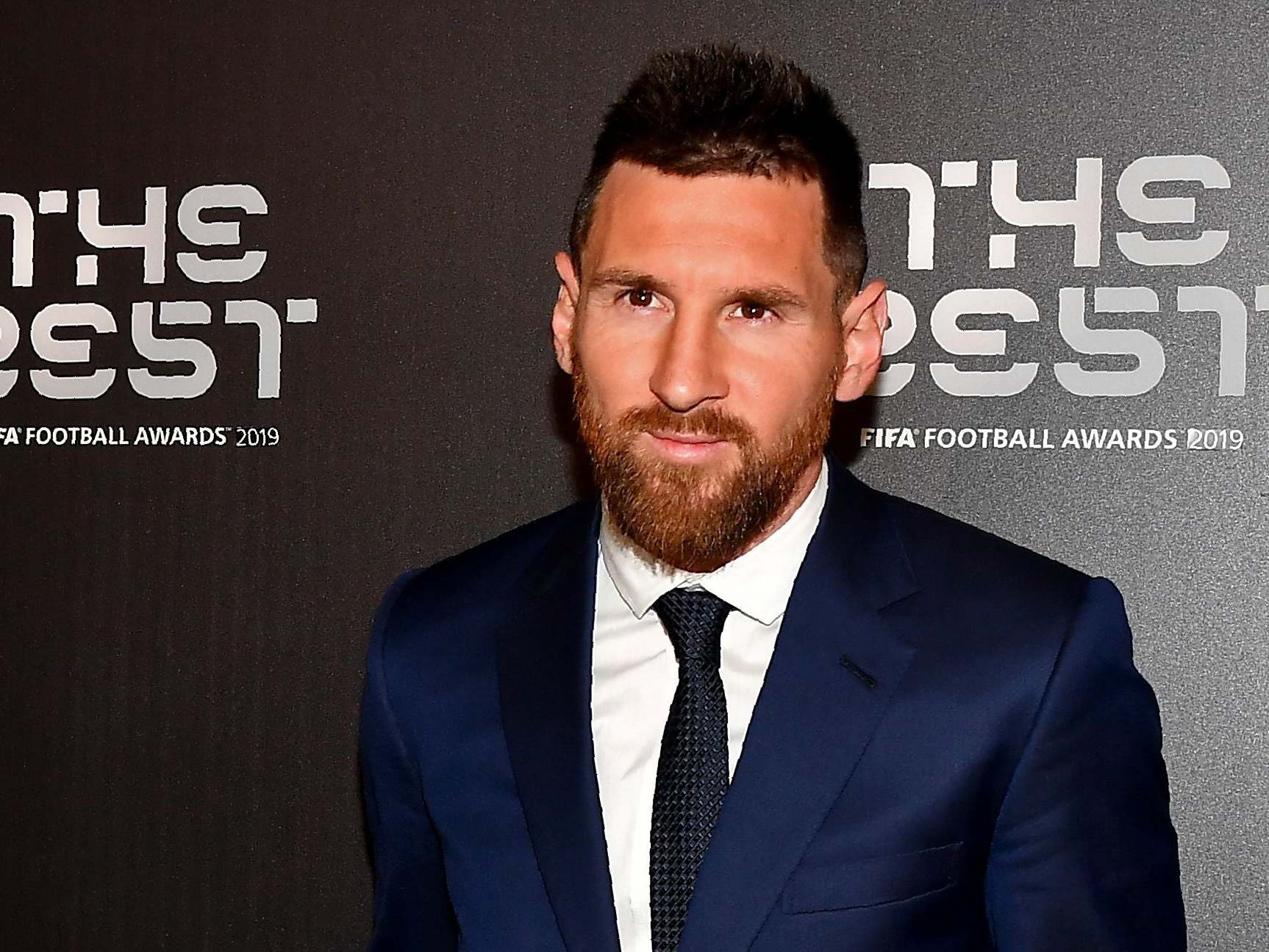 Lionel Messi arrives at the ceremony in Milan