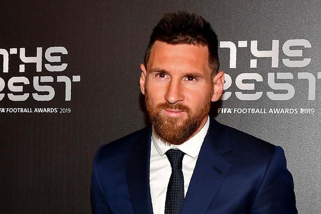 Lionel Messi arrives at the ceremony in Milan
